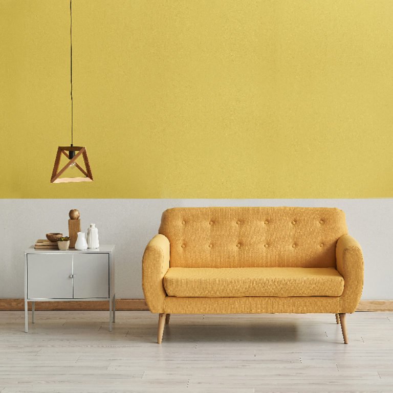 Modern yellow white wall yellow sofa with wooden lamp decor. Gre
