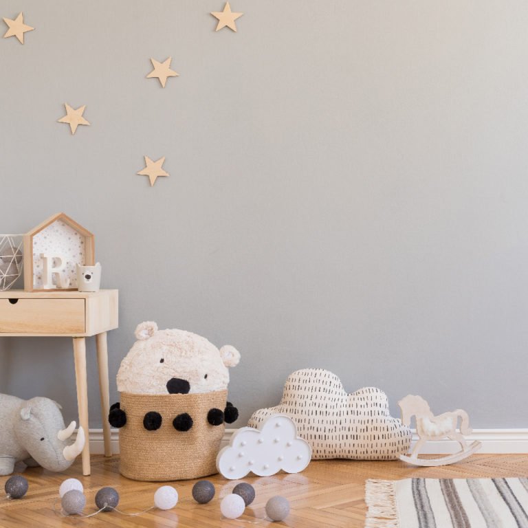 Stylish scandinavian newborn baby room with toys, children’s cha